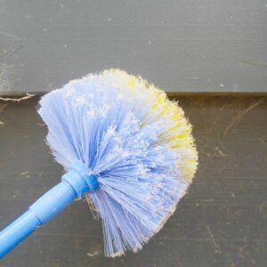 Tall Dust Cleaner Being Used to Clean Cobwebs During A Service Appointment Ordered Online From www.clickapro.com