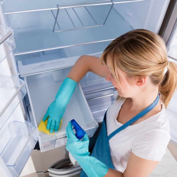 Service Tech From www.clickapro.com Cleaning a Fridge With Refrigerator Cleaning Services Ordered from CLICK-A-PRO