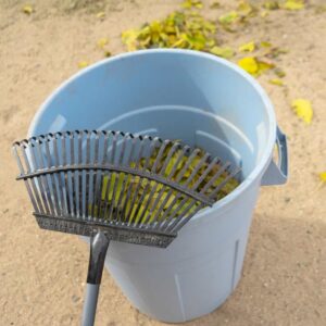 A Rake And A Trash Barrel In The Yard From Service Crews Hired At www.clickapro.com