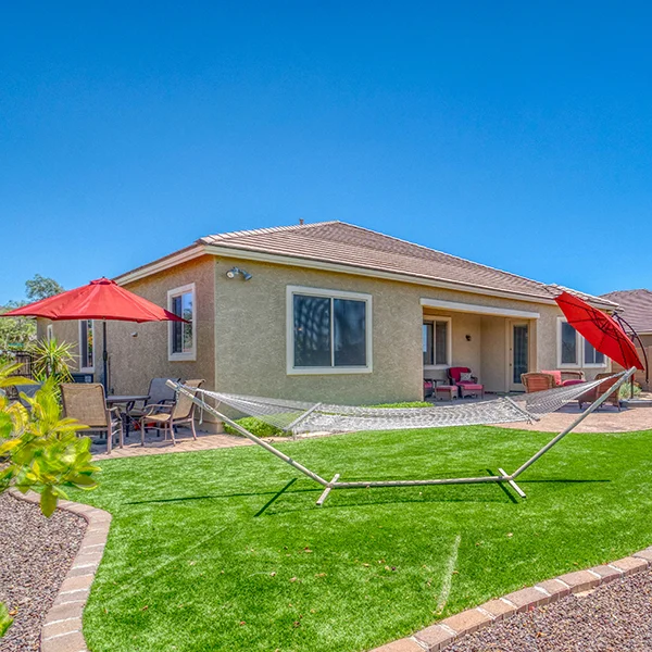 An Arizona home with its windows protected by solar window screens.