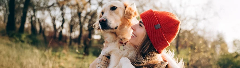 A woman and her dog out hiking in Prescott Arizona. They have more time to enjoy life because they have a subscription to Clickapro dog poop removal.