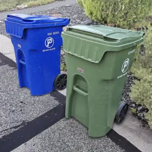 Clickapro Trash Can to Curb Service. Two trash bins placed next to the curb in Prescott, AZ.